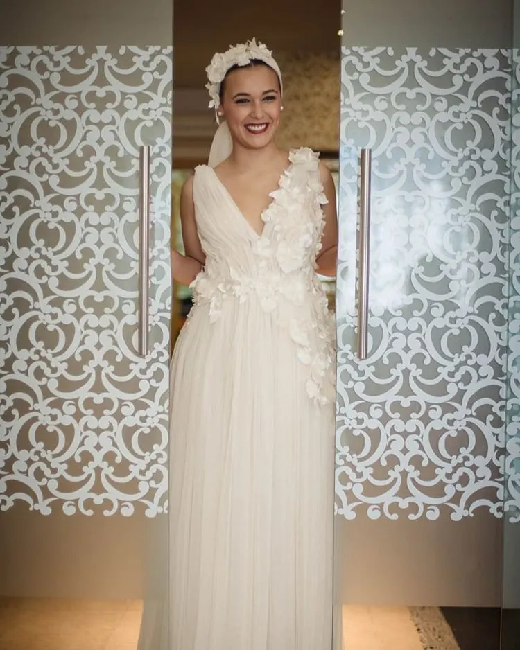 Alejandra - Ligero y aplicaciones florales - Detalle 6 del vestido de novia